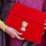 संसद भवन के भीतर वित्त मंत्री द्वारा बजट 2026-27 जवाब पर भाषण का दृश्य, आधिकारिक माहौल में।