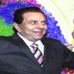 BAFTA अवॉर्ड समारोह के दौरान दिग्गज अभिनेता धर्मेंद्र को विशेष ट्रिब्यूट देते हुए दृश्य।